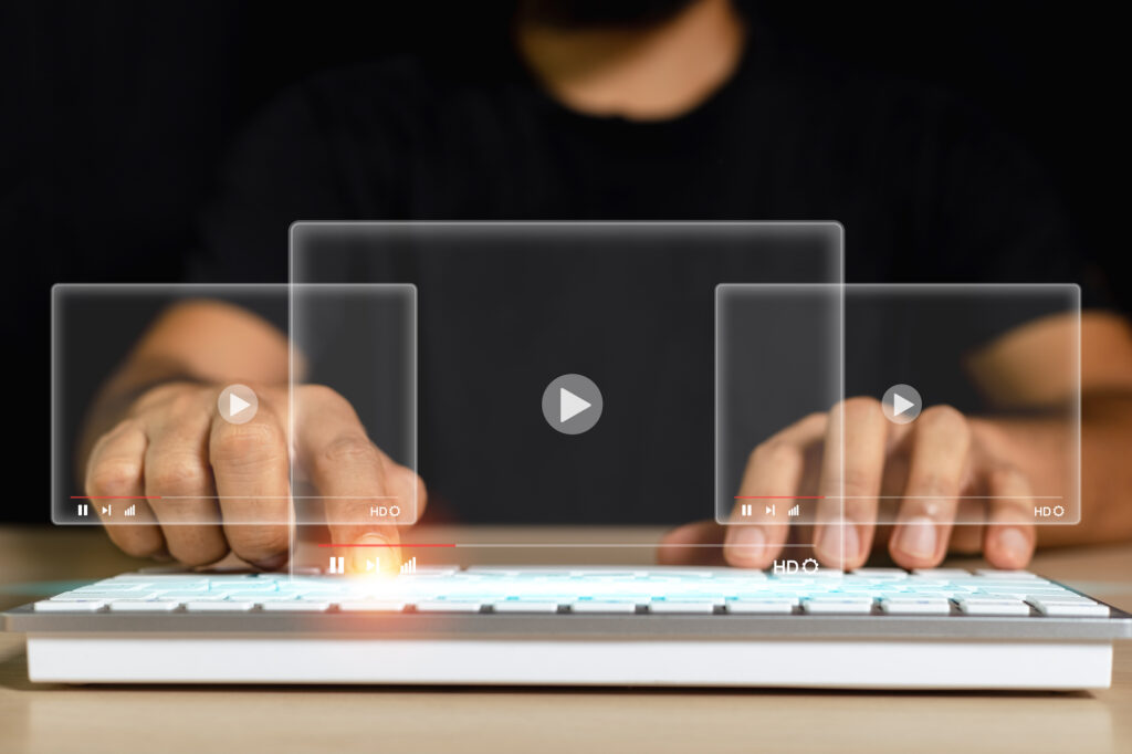 man using mouse keyboard computer with virtual screen watch videos online streaming. searching performances learning education on internet. online technology concept.