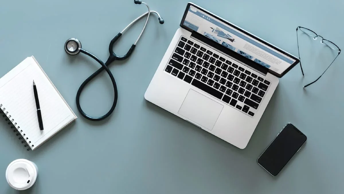 Laptop and medical equipment on a table